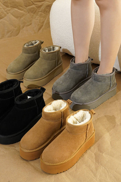 بوت نسائي قصير من جلد الغزال الطبيعي 100% من ماركة "هاغي" | نعل داخلي من إسفنج الذاكرة | خفيف الوزن | مانع للانزلاق